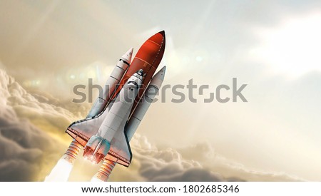 Space shuttle rocket flying in sky with clouds. Sun light on background. Expedition to space. Elements of this image furnished by NASA