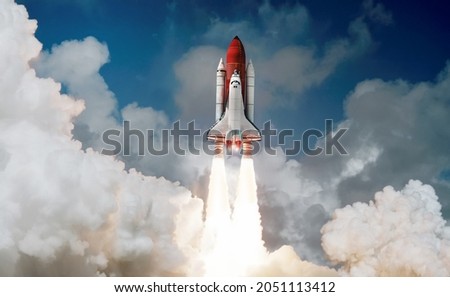 Space shuttle rocket launch in the sky and clouds to outer space. Sky and clouds. Spacecraft flight. Elements of this image furnished by NASA 