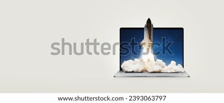 Space shuttle rocket ship successfully takes off from a laptop on gray background. Rocket with smoke launch. Laptop and growth optimization, concept. Startup boost, creative idea. Business lift off