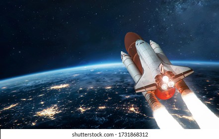 Space shuttle take off from Earth planet. Expedition in the deep space. Spaceship. Elements of this image furnished by NASA - Powered by Shutterstock
