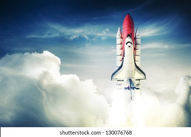 Space shuttle taking off on a mission - Shutterstock ID 130076768