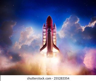 Space shuttle taking off on a mission / Photo composite of a repainted toy in a cloud background - Powered by Shutterstock