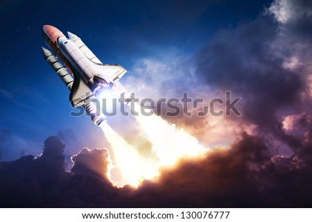 Space shuttle taking off on a mission