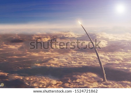 Space shuttle in the upper atmosphere. Elements of this image were furnished by NASA