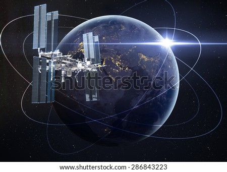 Space Station Orbiting Earth. Elements of this image furnished by NASA
