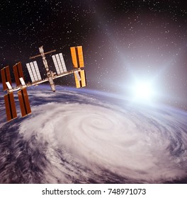 Spacecraft and the earth. The elements of this image furnished y NASA.