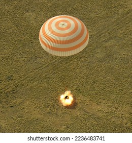 Spacecraft is seen as it lands with Expedition crew members return after 204 days in space. Space Station Crew Lands Safely in Kazakhstan. Digitally enhanced. Elements of this image furnished by NASA. - Powered by Shutterstock