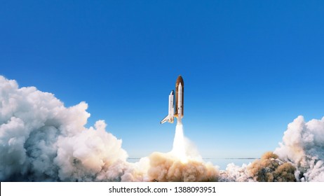 Spacecraft takes off into space. The rocket starts in the blue sky. Travel concept - Shutterstock ID 1388093951