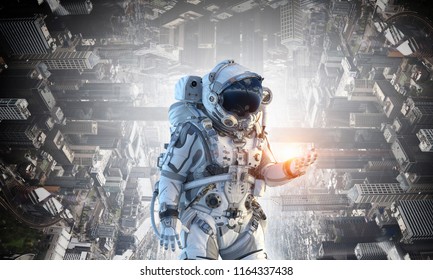 Spaceman and his mission. Mixed media - Shutterstock ID 1164337438