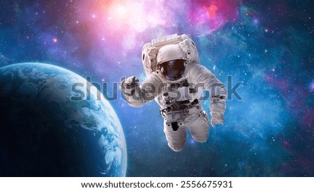 Spaceman in spacesuit flight in outer space with bright stars. Astronaut spacewalk on orbit of Earth planet. Cosmonaut floating in space. Elements of this image furnished by NASA