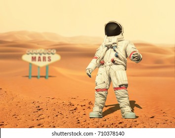 Spaceman Walks On The Red Planet Mars. Space Mission. Welcome To Mars Sign. Astronaut Travel In Space