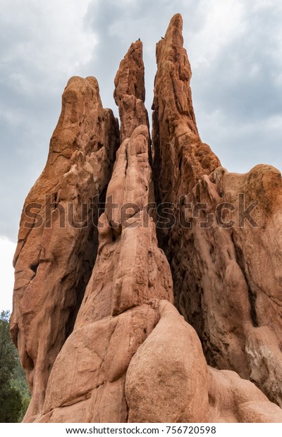 The spaces between layers of\
rock formations at Garden of the Gods in Colorado Springs,\
Colorado.