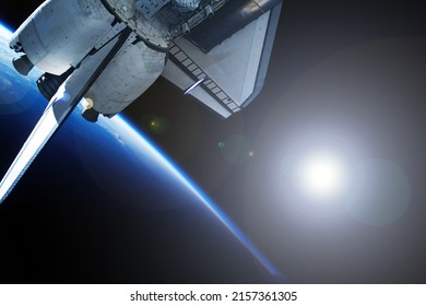 Spaceship Above The Earth. Elements Of This Image Furnished By NASA. High Quality Photo