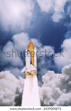 Spaceship launch in clouds.  The elements of this image furnished by NASA.