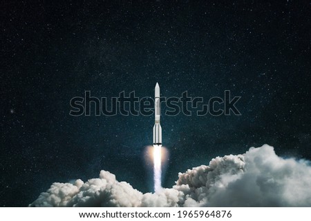 Spaceship launch into space. Rocket takes off in the starry blue sky