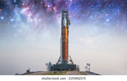 Spaceship on launch pad. Mission to Moon. Return to Moon. SLS space rocket. Orion spacecraft. Aretmis spae program to research solar system. Elements of this image furnished by NASA - Shutterstock ID 2193402575