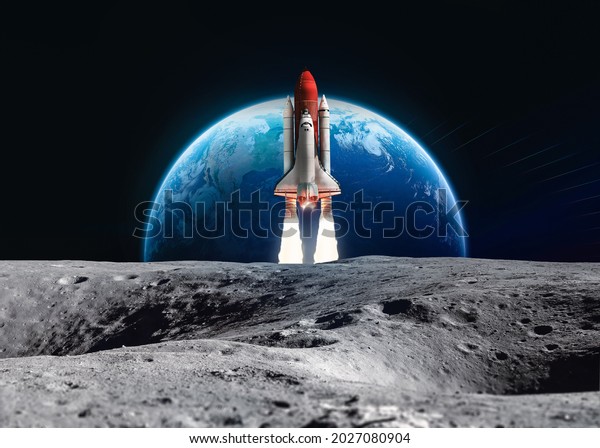 Spaceship in the outer space near Moon surface.\
Space shuttle in black space against Earth planet. Elements of this\
image furnished by\
NASA\
