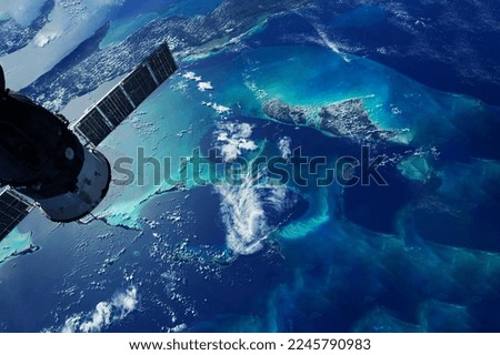 Spaceship over the Earth. Elements of this image furnished by NASA. High quality photo