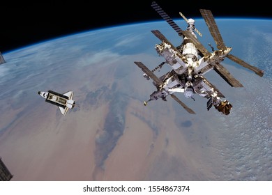 Spaceships in space. Science theme. The elements of this image furnished by NASA.