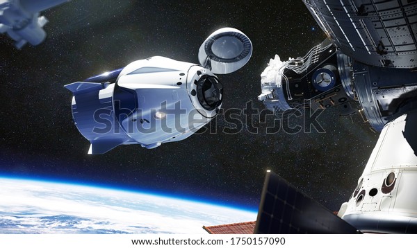 SpaceX Crew Dragon spacecraft docking to the\
International Space Station. Dragon is capable of carrying up to 7\
passengers to and from Earth orbit, and beyond. Elements of this\
image furnished by NASA