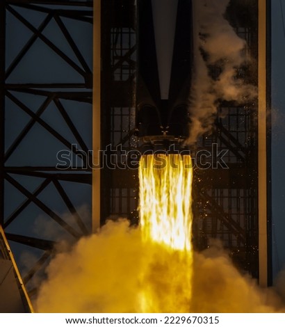 SpaceX rocket Falcon 9 launch zooming in on the flames emitted from the fuels. Elements of this image furnished by NASA.
