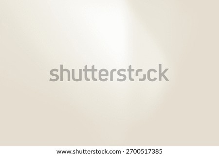 A spacious area features a smooth, neutral beige backdrop creating a calming atmosphere. The setting suggests a luxurious vibe suitable for stylish interior spaces.