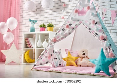 Spacious children room with play tent for girl. - Powered by Shutterstock