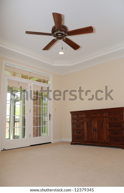 Spacious Empty Room Only Dresser Fan Royalty Free Stock Image