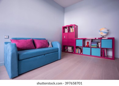 Spacious Kid Room With Pink And Blue Furniture