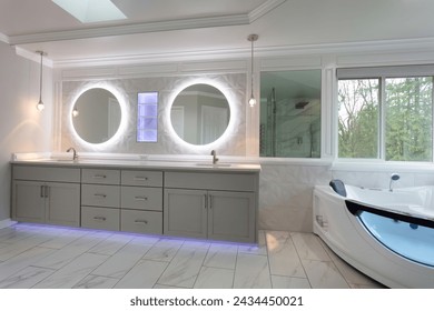 Spacious modern contemporary master bathroom with remodel of vanity and wall plus shelf with lights