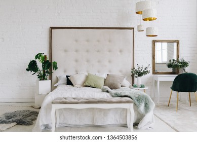 Spacious Modern Scandinavian Loft Bedroom. Bright Room. Modern Interior. Bed With Big Headboard.