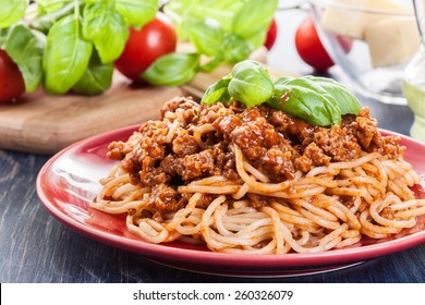 Spaghetti Bolognese With Cheese And Basil On A Plate