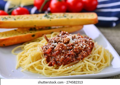 Spaghetti Bolognese With Garlic Bread Baguettes.