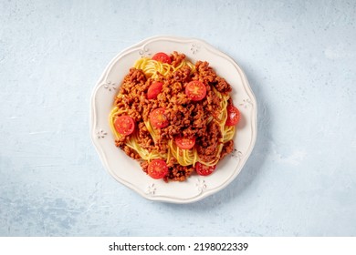 Spaghetti Bolognese Pasta With Cherry Tomatoes, Overhead Flat Lay Shot