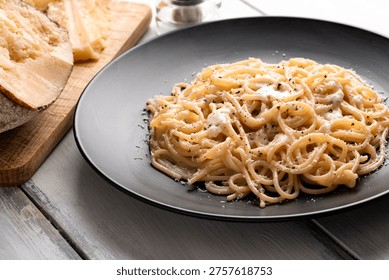 Spaghetti Cacio e Pepe, typical pasta recipe from Roman cuisine, Italian Food 