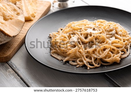 Spaghetti Cacio e Pepe, typical pasta recipe from Roman cuisine, Italian Food 