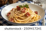 Spaghetti Carbonara: Classic Italian pasta with creamy egg sauce, crispy pancetta, Parmesan, and black pepper. Rich, satisfying, and indulgent.