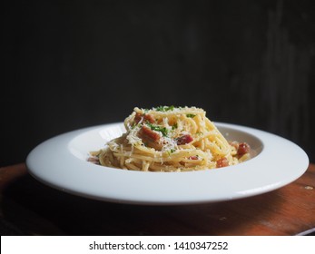Spaghetti Carbonara Dish In Dark Food Photography Style