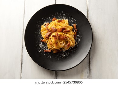 Spaghetti Carbonara, a traditional recipe of pasta of roman cuisine, italian food  - Powered by Shutterstock