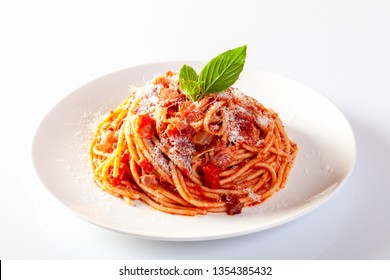 Spaghetti in a dish on a white background