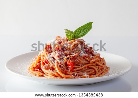 Spaghetti in a dish on a white background