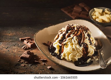 Spaghetti ice cream dessert with chocolate sweet sauce