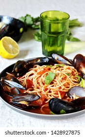 Spaghetti With Mussels, Tomato Sauce. Sea Food Meal. Mussels Marinara. Typical Dish Of Italian Pasta.