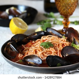 Spaghetti With Mussels, Tomato Sauce. Sea Food Meal. Mussels Marinara. Typical Dish Of Italian Pasta.