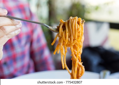 Spaghetti on a fork.