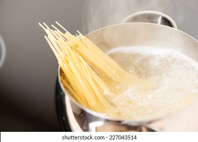 Spaghetti In Pan Cooking In Boiling Water