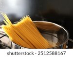 Spaghetti, pasta dish, Italian food, tomato sauce, noodles, traditional pasta, Italian cuisine, garlic pasta, savory meal, dinner plate, gourmet spaghetti, Mediterranean food, classic pasta, al dente 