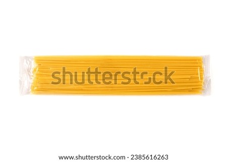 Spaghetti pasta in plastic package isolated on white background.