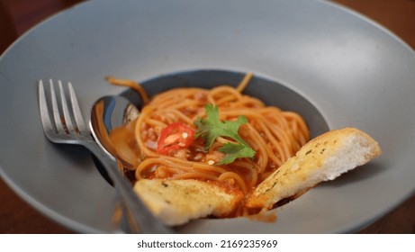 Spaghetti Red Sauce With Garlic Bread In Thailan