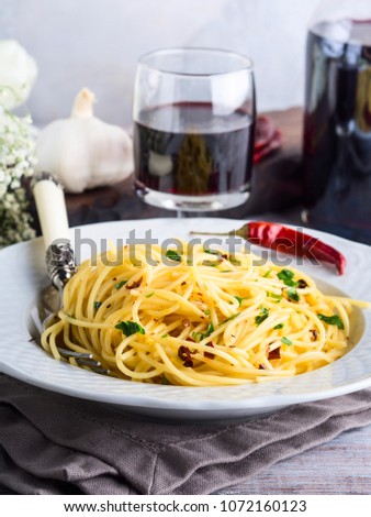 Spaghetti with spicy red pepper, garlic, olive oil. Traditional Italian pasta dish